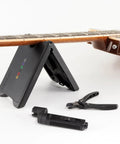 Ultimate Tour Grade Guitar String Changing Kit with peg winder, bridge pin puller, cutter, and case with neck rest