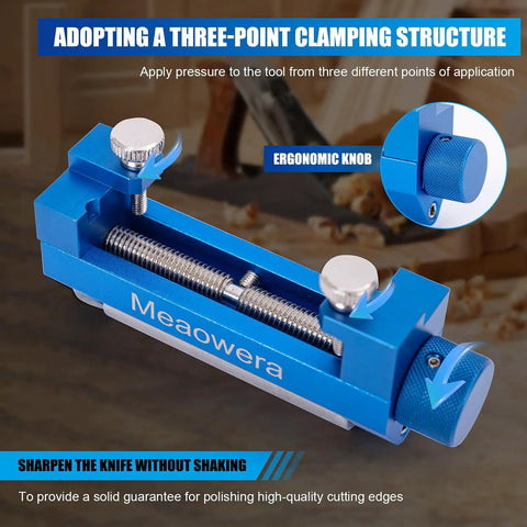 Pro Grade Chisel Sharpening Kit With Sharpening Stones And Honing Guide, blue clamping tool with ergonomic knobs on workbench.