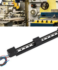 Heavy Duty 200Mm Stroke Xyz Linear Stage Actuator Featuring Single Rail Design And Tough Metal Frame For Cnc Milling installed in a workshop.