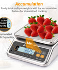 Pro Grade Commercial Food Scale With Pound And Ounce Conversions; strawberries on stainless-steel platform, buttons visible