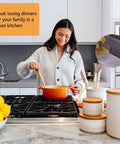 Woman cooking on stovetop with focus on Stove Gap Cover 21 Inch Silicone Gap Filler For Between Stovetop And Counter Heat Resistant