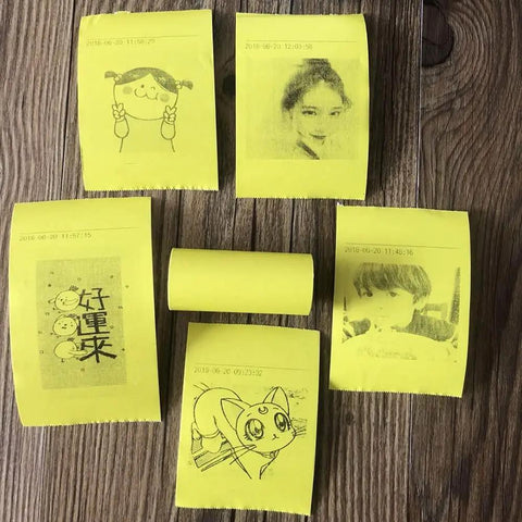 Twenty Pack Square Thermal Receipt Paper For Mini Pos Printers Self Adhesive Photo Sticker Rolls, featuring yellow print and artwork.