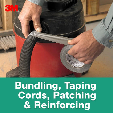 Man using Heavy Duty Duct Tape That Is The Go To For Everyday Fixes With Beast Mode Strong Adhesive And Waterproof Backing 1.88 inch by 60 yard Multi Use Tape For Bundling Cords Patching And Reinforcing Durable And Long Lasting to fix a vacuum hose.
