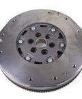 Heavy Duty Dual Mass Flywheel Built Crazy Tough For Smooth Shifting And Hella Reliable Torque Dampening Direct Bolt On German Engineering Straight Up Street Beast, showing precision balanced metal construction.
