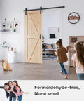 Rock Solid Spruce Sliding Barn Door 32 By 84 Inches With Heavy Duty Track Hardware And Modern Catch open in a stylish living room.