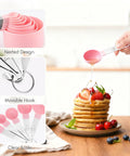 Stackable Measuring Cups And Spoons Set 10 Piece With Stainless Steel Handles Pink Kitchen Gear in use while serving pancakes.