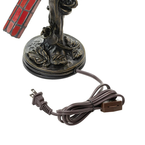 Close-up of the bronze-toned tree base with floral details and cord of Stained Glass Bird Accent Lamp With Tiffany Style Vibe, Blue Jay Design