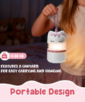 Child holding Two Pack Unicorn Themed Kids Camping Lanterns With RGB Multicolor Lights Battery Powered With Handy Lanyard