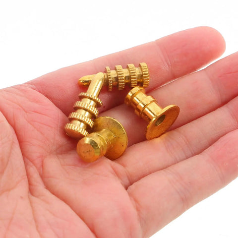 Leaf Connector Kit Set For Furniture And Wardrobe Shelves, Zinc Alloy Dowel Pins With Copper Sleeves in hand
