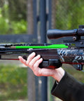 Person holding crossbow with 6.3 Inch Crossbow Bolts 36 Pack For 50 To 80 Lb Mini Crossbows, metal tips, plastic fletching