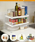 Expandable Foil And Plastic Wrap Organizer, 3-Tier Height Adjustable Kitchen Cabinet Rack with spices and cans displayed