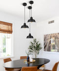 Black Industrial Pendant Lights Set Of 3 Modern Farmhouse Ceiling Fixtures in dining room with table and chairs