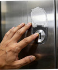 Hand using elevator with 4 Pack Power Button Cover Protectors For Elevators And Washing Machines, Plastic Push Button Guard With Anti Misoperation Design.