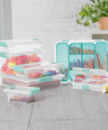 Sixteen Pack Clip Boxes Stackable Clear Plastic Storage Bins With Latching Lids For Crafts Supplies Home Office Classroom And Workshop Organization Medium Containers holding craft supplies on a table