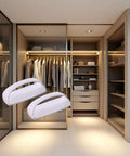 Two Pack White Adhesive Handles Self Stick Wardrobe Cabinet Drawer Pulls No Drill Easy Install For Glass Windows Sliding Doors Furniture Durable Adhesive Mount With Strong Hold against a modern wardrobe.