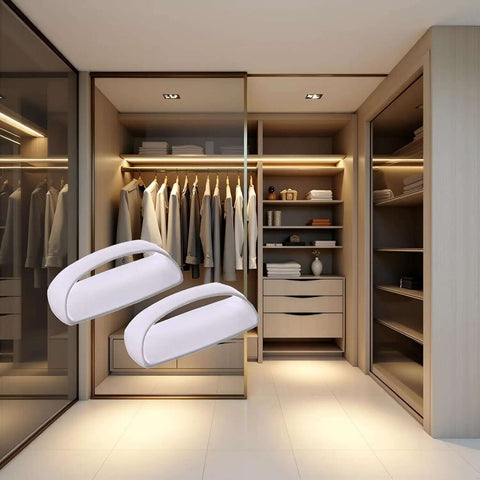 Two Pack White Adhesive Handles Self Stick Wardrobe Cabinet Drawer Pulls No Drill Easy Install For Glass Windows Sliding Doors Furniture Durable Adhesive Mount With Strong Hold against a modern wardrobe.