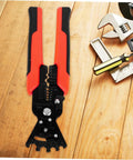 Badass Heavy Duty Wire Stripper And Crimper Pliers With Slick Bending Jaw Pro Grade Electrician Gear on wooden surface.