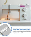 Sewing machine with stainless steel twin needles and pintuck presser foot for heavy-duty use in crafting and garment making.
