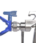Close-up of Professional Airless Paint Spray Gun Forged From Tough Aluminum And Equipped With A Blue 517 Tip for accuracy.