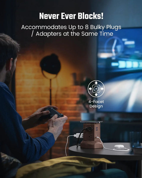 Person using gaming console with Power Strip Surge Protector Tower With 15W Wireless Charger 13A Charging Station in home setup.