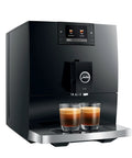 Top Tier Automatic Coffee Maker In Sleek Piano Black With One Touch Brewing For Barista Style Espresso and Creamy Latte Blends Made Daily Without The Sweat, dual coffee output.