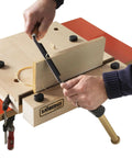 Heavy Duty Portable Woodworking Vise Offering Ridiculous Grip and Chunky MDF Top Slick Design with precision cutting on workbench.