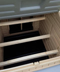 Interior view of Snap Lock Large Chicken Coop For Backyards showing wooden roosts and durable plastic construction for hens and bantams.