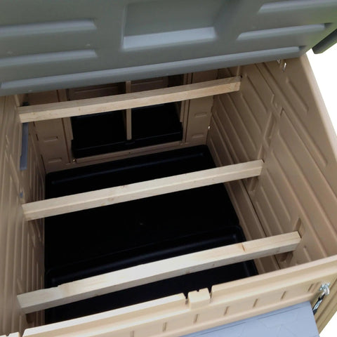 Interior view of Snap Lock Large Chicken Coop For Backyards showing wooden roosts and durable plastic construction for hens and bantams.
