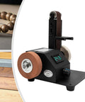 Straight Up Workhorse Mini Electric Belt Sander And Tabletop Polisher With Variable Speed Control on a workstation for DIY crafts.