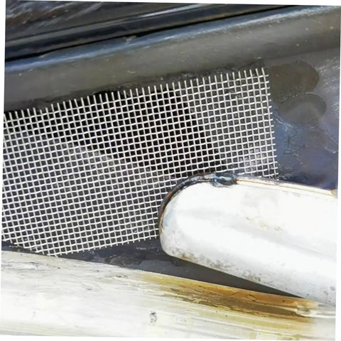 Close-up of welding mesh kit for car bumper repair durable metal wire screen in use for quick fix of cracks on automotive restoration.