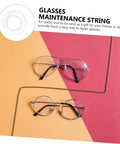 Glasses and eyeglass repair string on vibrant background, showcasing Eyeglass Repair Thread For Easy Maintenance And Quick Fixes Handy Durable