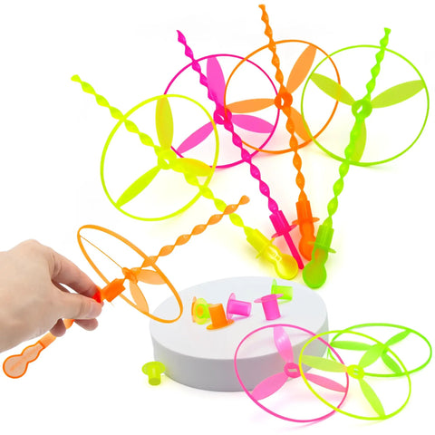 Colorful 50 Pack Flying Disc Toy Set With Swirly Sticks, Spinners, And Rings for Kids, shown with hand using Easy Pull And Fly Action.