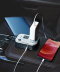 Beast Mode Compact Car Power Inverter Step Up Dc Twelve Volt To One Hundred Eleven V Using Twenty Seven Watt Pd Usb C and Dual USB ports with smartphone charging on a car console.