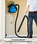 Person using 5 Gallon Wall Mount Wet Dry Vacuum With Remote Control 5 Peak HP Ultra Quiet 2 Stage Motor For Easy Shop And Garage Cleanup For Home Blue Built For Quick Cleanup Power