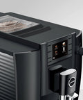 NoDrama Automatic Coffee Machine With OneTouch Espresso Brewing Milk Froth And Rapid SelfClean Design Programmable Strength Volume Controls For Smooth Daily Grinds In Piano Black top view with bean container and control panel.