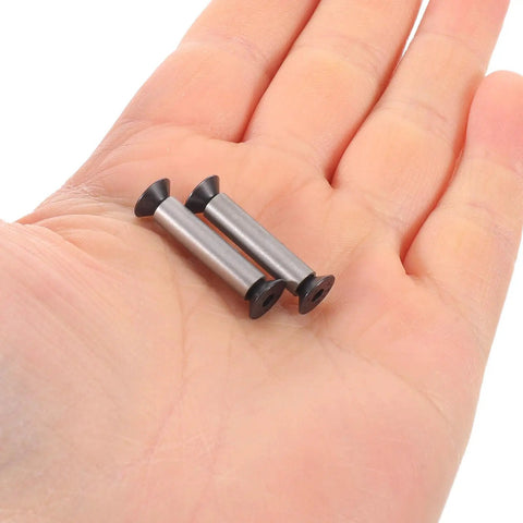 Hand holding flat head pin rivets from Six Piece Knife Handle Replacement Screws Kit With Flat Head Pin Rivets M4 Stainless Steel Nuts