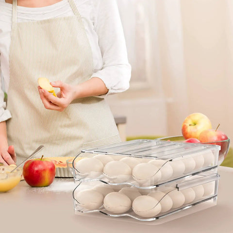 Auto Rolling Egg Holder For Fridge With 36 Egg Capacity in kitchen with apples and person in apron