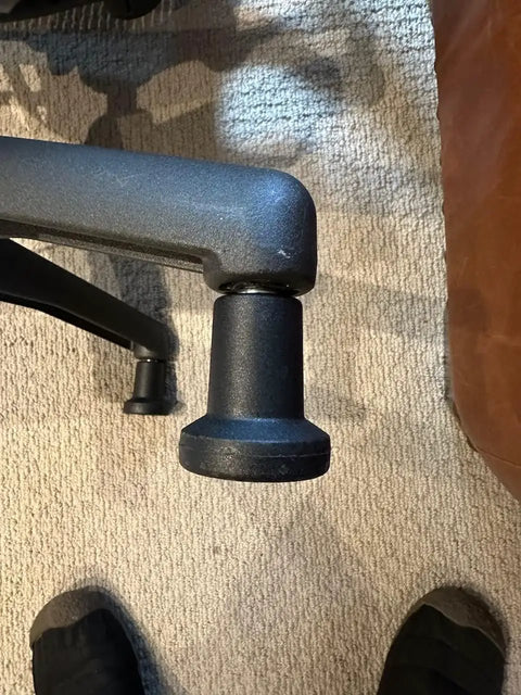 No Slip Bell Glides For Office Chairs And Stools Replacement High Profile Stationary Castor Wheels With Stick On Felt Pads Super Smooth Roll On Carpet Floors Pack Of Five Pieces mounted on chair leg.