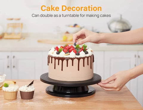 Person decorating a cake on an 11 Inch Rotate Turntable For Cake Decorating And Painting With Smooth Ball Bearing Spin And 360 Degree Rotation Black Lightweight Display Stand For Spinning Spraying Decorating And Sculpting Projects By Kootek.