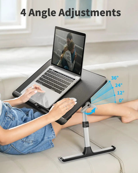 Go To Adjustable Laptop Bed Tray Table With Storage Drawer Fits 17 Inch Laptop Portable Foldable Lap Desk on couch with angle adjustment visible