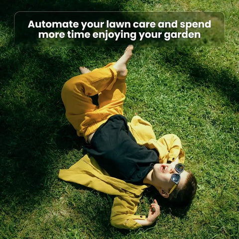 Child laying on grass illustrating the benefit of Beast Automatic Lawn Mower Robot E1600T for large yards with 3600 sqm coverage.