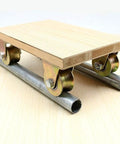 Heavy Duty U Groove Gate Casters 2 Inch Steel Gate Wheels Bearing 660 Lbs Per Wheel Rigid Track Rollers mounted on metal rails.
