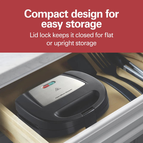 Hamilton Beach Electric Sealed Sandwich Maker Grill For Hot Pockets And Grilled Cheese in a drawer, compact design with lid lock.
