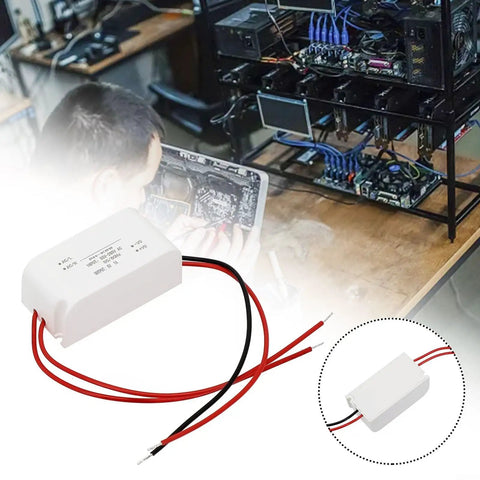 Built Tough AC DC Power Supply Module 5V 1A 5W Step Down Converter mounted in a tech setup with tools and components.