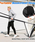 Person moving Outdoor Adjustable Basketball Hoop With 40 44 48 Inch Backboards 5.3 To 10 Ft Height Portable Wheels Heavy Duty Steel Frame