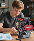 Person assembling V8 Engine Building Set That Runs Build Your Own 8 Cylinder Engine With Battery And Motor 478 Pieces STEM Toy