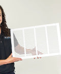 12 Inch By 6 Inch Duct Opening Flat Stamped Steel Return Air Grille For Sidewall And Ceiling White Finish held by person
