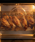 Badass Rotisserie Drum Basket Mesh Cage For Backyard Grills And Home Ovens Fits Standard One Quarter Inch Shaft with chicken wings.
