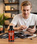 Man using 30G Glass Scratch Remover for Phone Screens With Sponge Gentle Polishing Quick Fix Cream on a smartphone with scratches