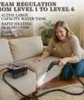 Woman using High Pressure Steam Cleaner For Home Deep Clean Blasts Scalding Hot Vapor To Erase Tough Grease From Tile And Sofa.